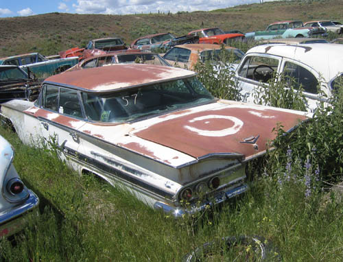 The 1960 Impala as it was found in a field