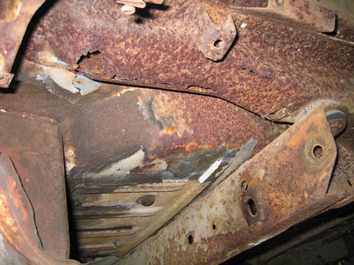Rusted out rear floor brace
